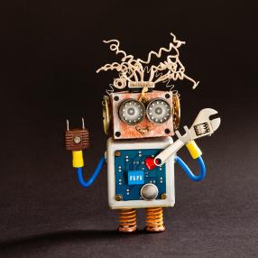 A robot analyzing data on a digital interface, representing AI-powered data analysis and integration in business workflows